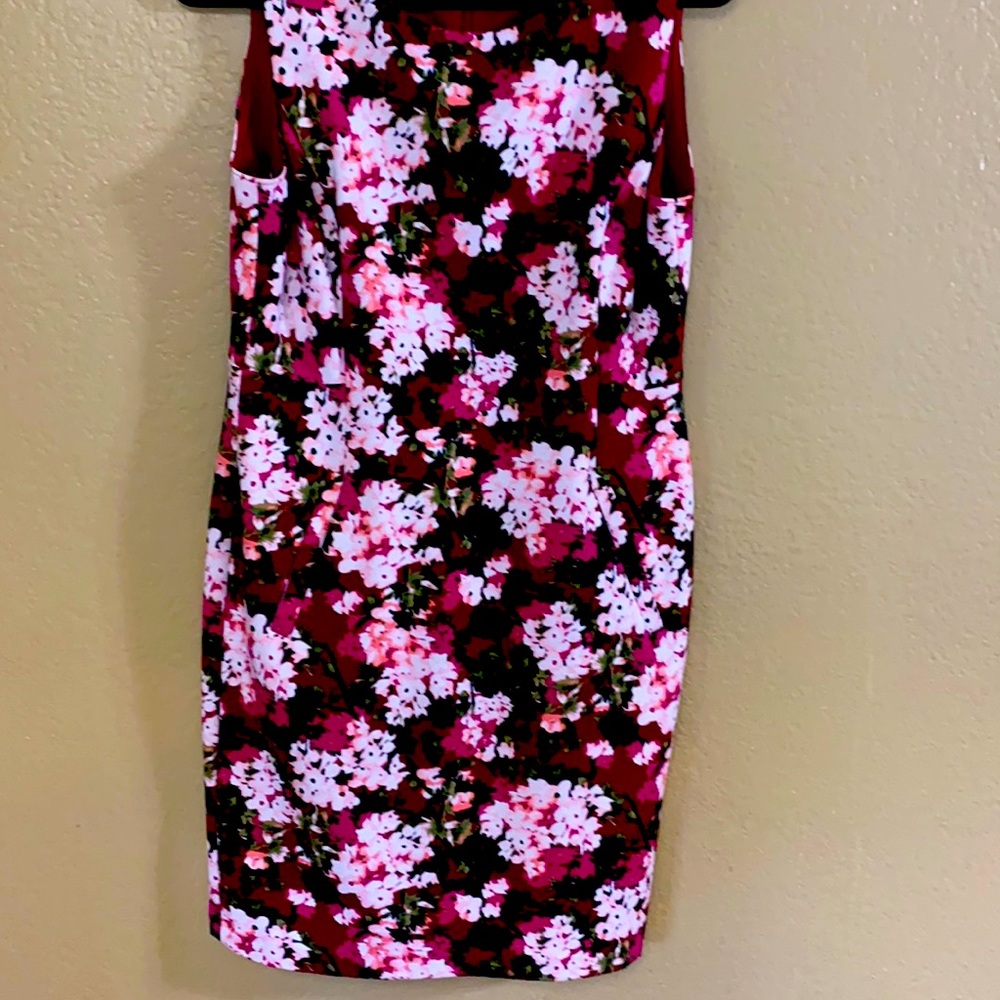 This dress was worn once. It is in like new condition.The pockets are unopened.